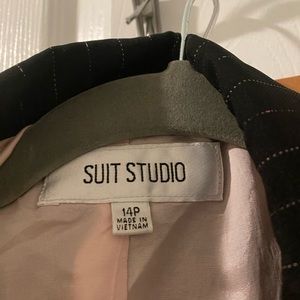 Women suit studio size 14p business suit. Clean, no signs of wear and tear.